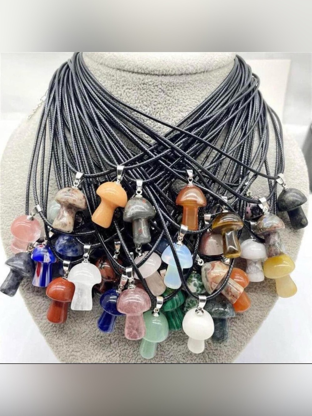1 random surprise mushroom crystal necklace.